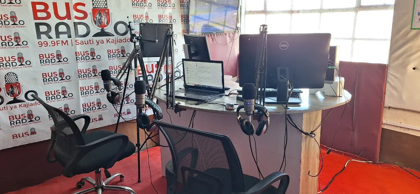 The Bus Radio studio, with microphones and audio equipment